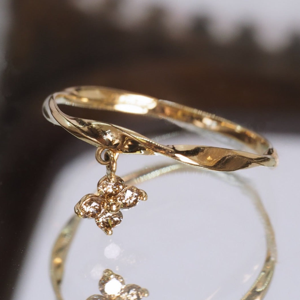 The Dangling Brown Diamond Clover Golden Twist Ring